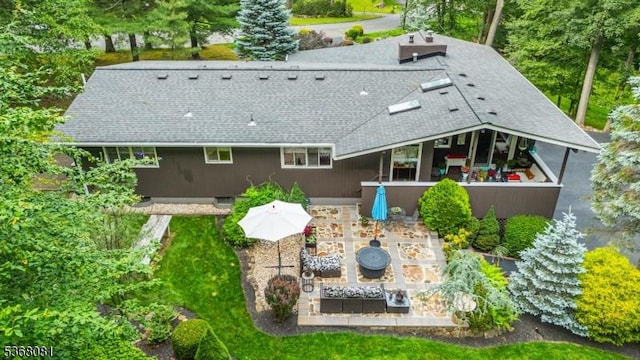 7 Deer Ct, Chester Twp, NJ 07930 - back of house featuring roof with shingles and a patio area