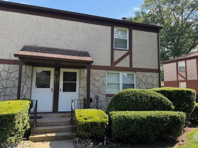 185 High St, Metuchen Boro, NJ 08840 - view of front of home with stone siding and stucco siding
