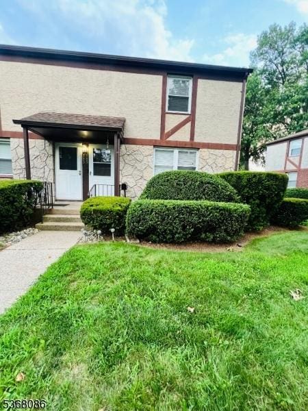 185 High St, Metuchen Boro, NJ 08840 - view of front of property featuring stone siding and stucco siding