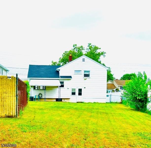 3 Gregory Ter, Belleville Twp, NJ 07109 - back of house featuring a chimney