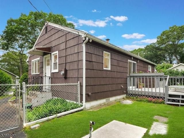 8 Blanche Dr, Jefferson Twp, NJ 07849 - view of property exterior featuring a wooden deck, a gate, and crawl space