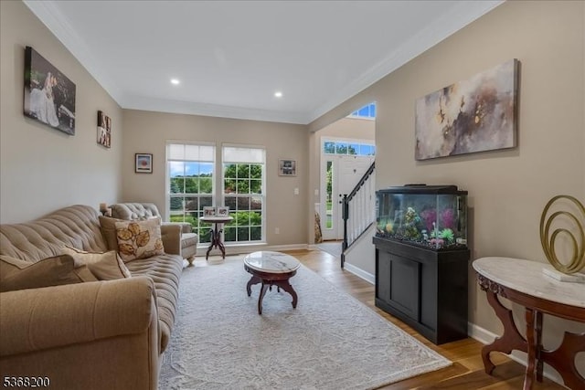 40 Primrose Ln, Sparta Twp, NJ 07871 - living room with wood finished floors, ornamental molding, stairs, and recessed lighting