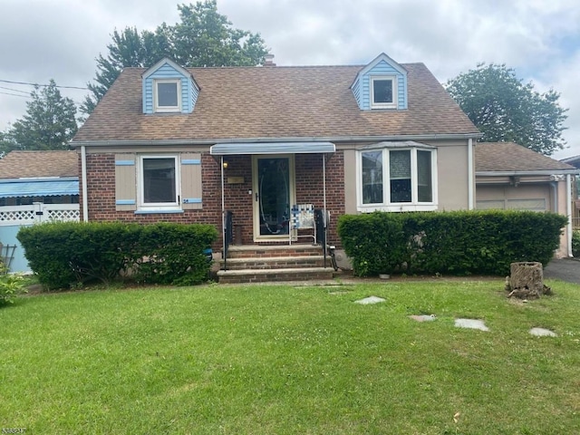 54 Heather Ln, Roselle Boro, NJ 07203 - cape cod-style house with a front lawn, brick siding, and a shingled roof