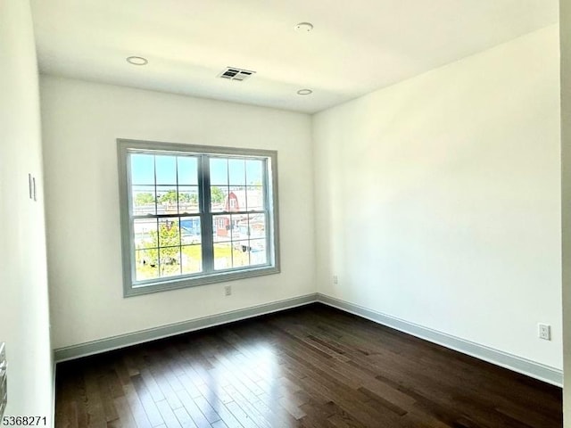 47 Bird Ave, Woodbridge Twp, NJ 08830 - unfurnished room featuring dark wood-type flooring and baseboards
