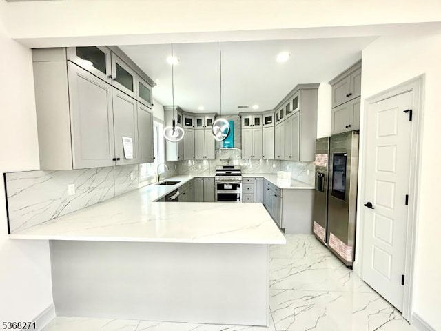 47 Bird Ave, Woodbridge Twp, NJ 08830 - kitchen with appliances with stainless steel finishes, gray cabinetry, a peninsula, light marble finish floors, and recessed lighting