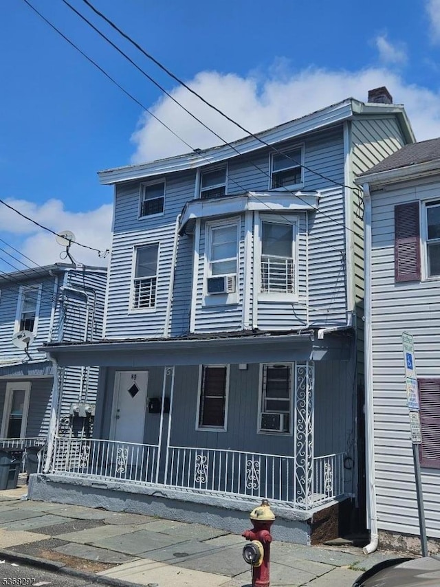 69 Beech St Unit 2, Paterson City, NJ 07501 - townhome / multi-family property with a porch