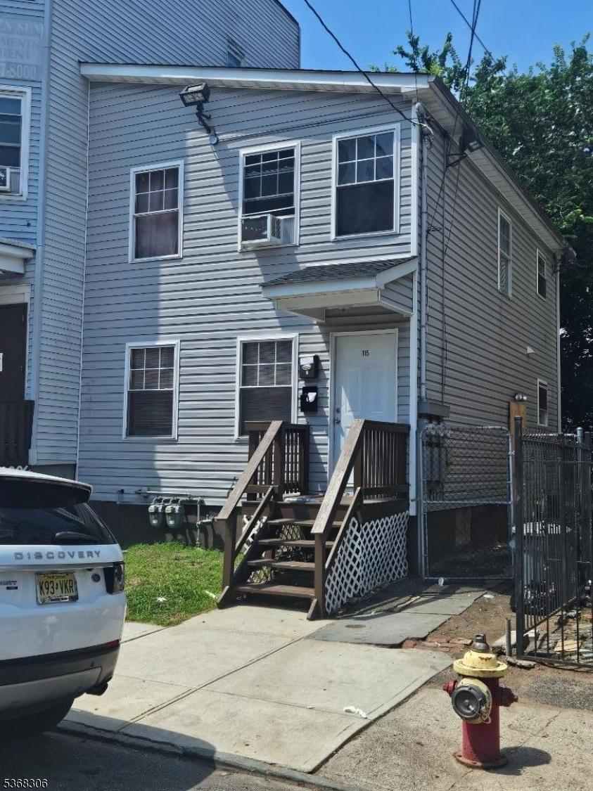 115 Godwin Ave Unit 2, Paterson City, NJ 07501 - view of front facade featuring cooling unit