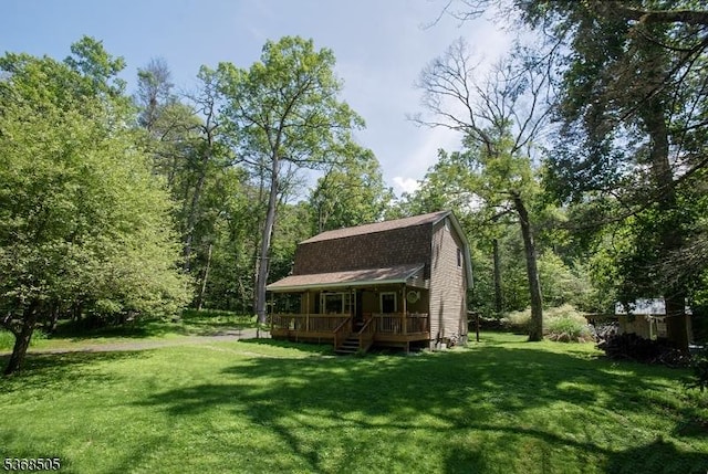 115 Bierskill Rd, Montague Twp, NJ 07827 - view of green lawn with a porch