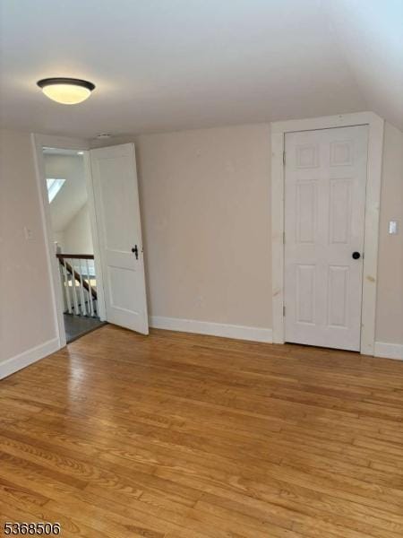 196 Littleton Rd, Morris Plains Boro, NJ 07950 - unfurnished room featuring light wood-style floors and lofted ceiling