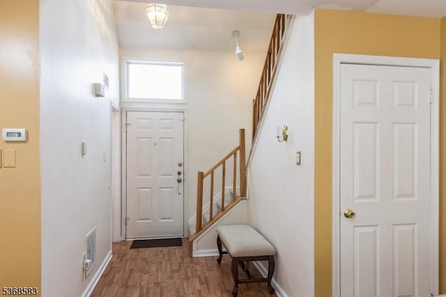 76 Avebury Pl, Franklin Twp, NJ 08873 - foyer featuring stairway and wood finished floors