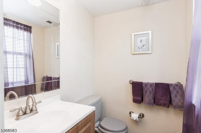76 Avebury Pl, Franklin Twp, NJ 08873 - bathroom with toilet and vanity