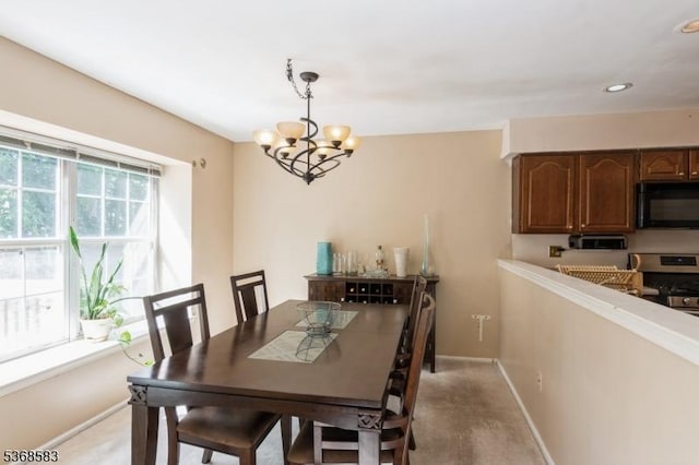 76 Avebury Pl, Franklin Twp, NJ 08873 - dining area with a chandelier, light carpet, and recessed lighting