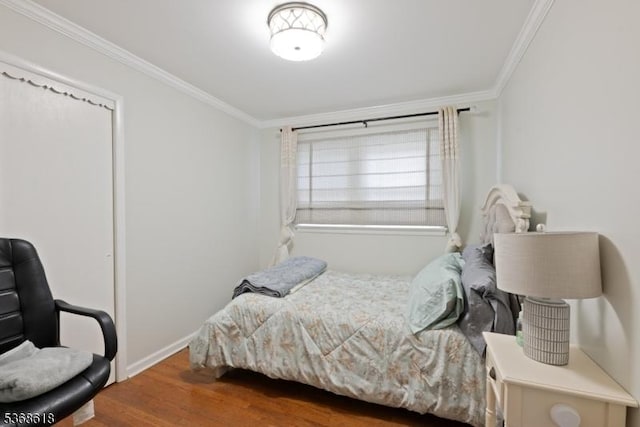 724 Bloomfield Ave, Clifton City, NJ 07012 - bedroom featuring ornamental molding and wood finished floors