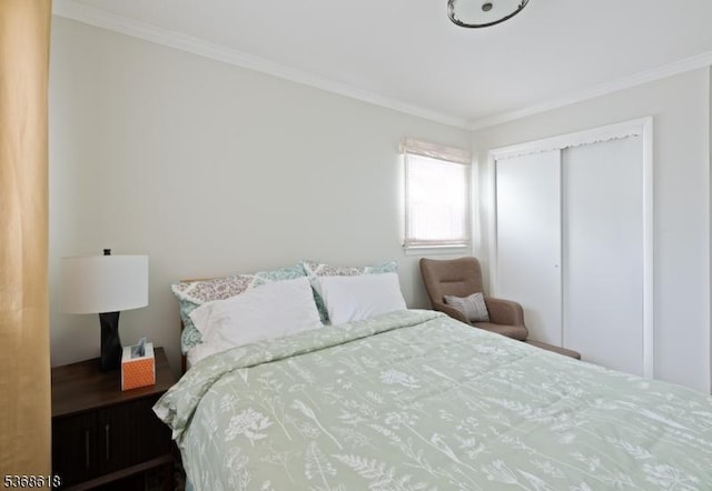 724 Bloomfield Ave, Clifton City, NJ 07012 - bedroom featuring crown molding and a closet