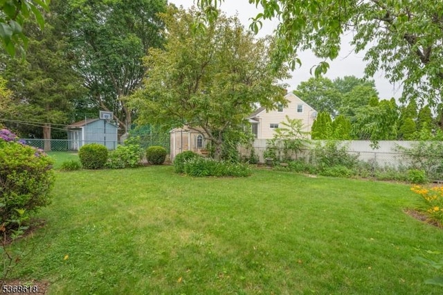 724 Bloomfield Ave, Clifton City, NJ 07012 - fenced backyard featuring a shed
