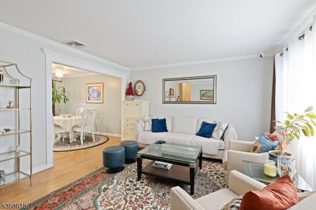 724 Bloomfield Ave, Clifton City, NJ 07012 - living area featuring wood finished floors and crown molding