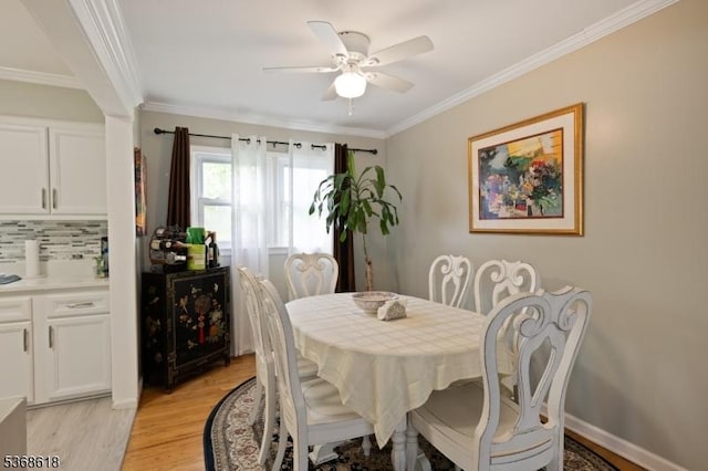 724 Bloomfield Ave, Clifton City, NJ 07012 - dining room featuring ceiling fan, light wood-style flooring, and ornamental molding