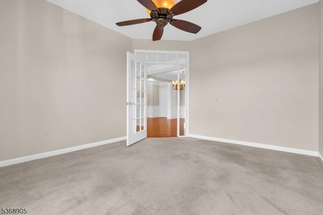 3304 Chesterwood Way, Franklin Twp, NJ 08873 - empty room with carpet flooring, french doors, a ceiling fan, and a chandelier