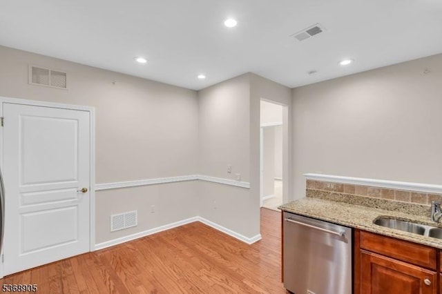 3304 Chesterwood Way, Franklin Twp, NJ 08873 - kitchen featuring dishwasher, light wood finished floors, light stone counters, recessed lighting, and brown cabinets
