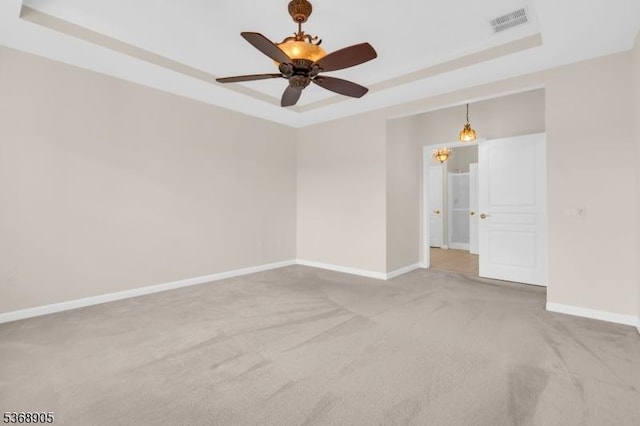 3304 Chesterwood Way, Franklin Twp, NJ 08873 - empty room featuring a raised ceiling, carpet flooring, and a ceiling fan
