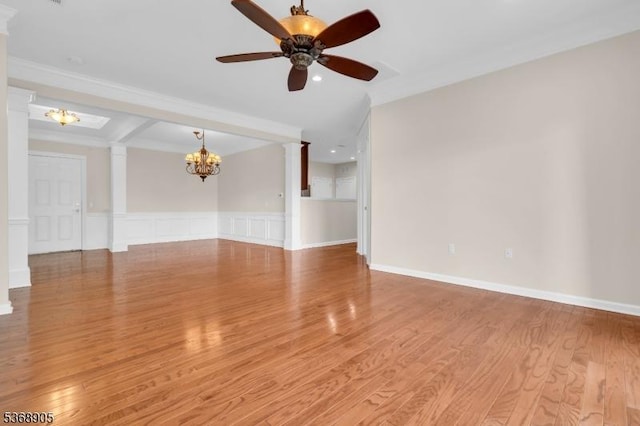 3304 Chesterwood Way, Franklin Twp, NJ 08873 - spare room featuring ornate columns, a chandelier, a ceiling fan, crown molding, and a wainscoted wall