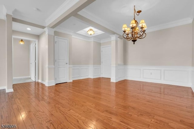 3304 Chesterwood Way, Franklin Twp, NJ 08873 - unfurnished room with a chandelier, crown molding, wood finished floors, a wainscoted wall, and beam ceiling