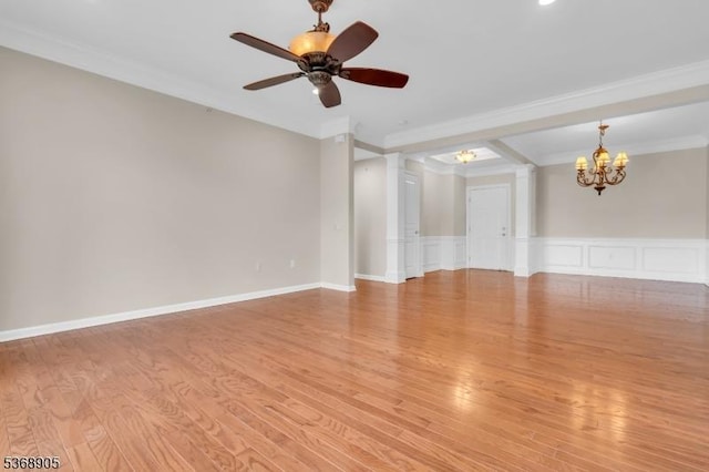 3304 Chesterwood Way, Franklin Twp, NJ 08873 - empty room with a chandelier, ornamental molding, a ceiling fan, light wood-style floors, and ornate columns
