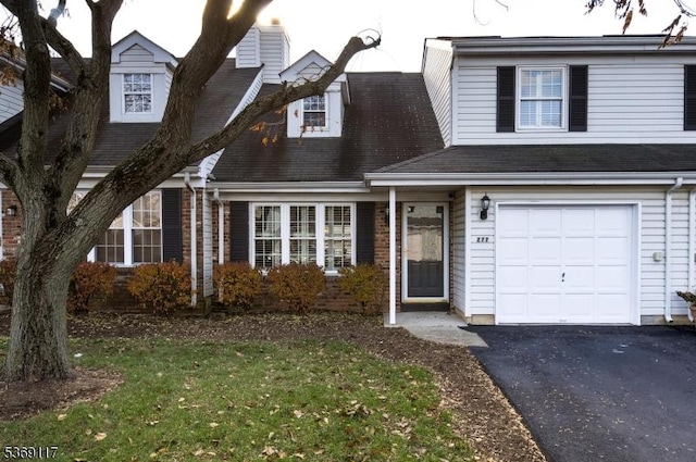 277 Edgeware Ct, Franklin Twp, NJ 08873 - view of front of home featuring a garage, a chimney, and a front lawn