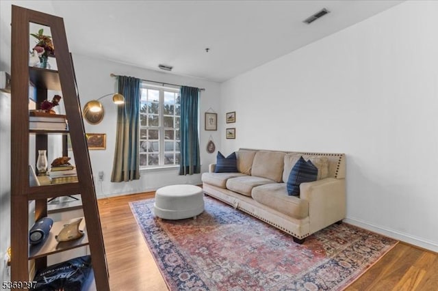 301 Rainbow Way Unit 301, Lopatcong Twp, NJ 08865 - living area featuring wood finished floors and baseboards