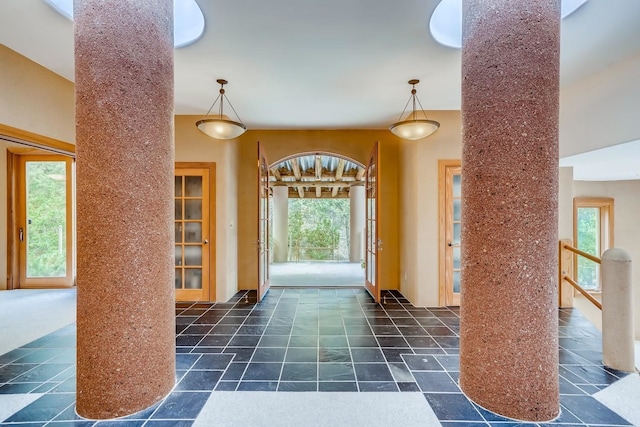 interior space with dark tile floors