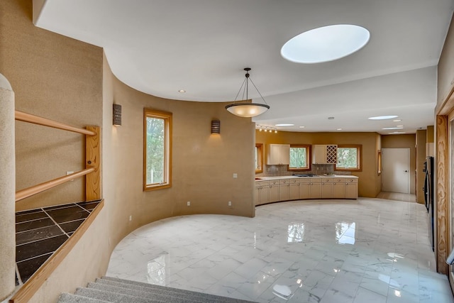 interior space featuring light tile floors