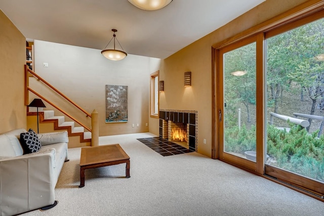 carpeted living room featuring a brick fireplace