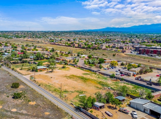 drone / aerial view featuring a mountain view