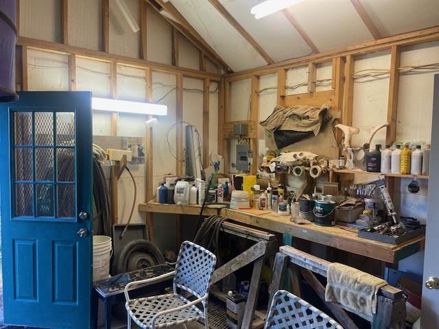 miscellaneous room featuring vaulted ceiling