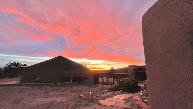 view of property exterior at dusk