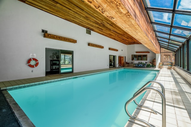 view of pool featuring a lanai