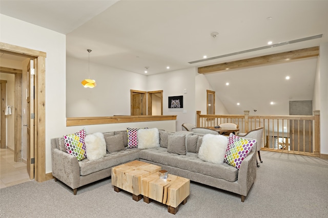 living room featuring vaulted ceiling with beams and light colored carpet