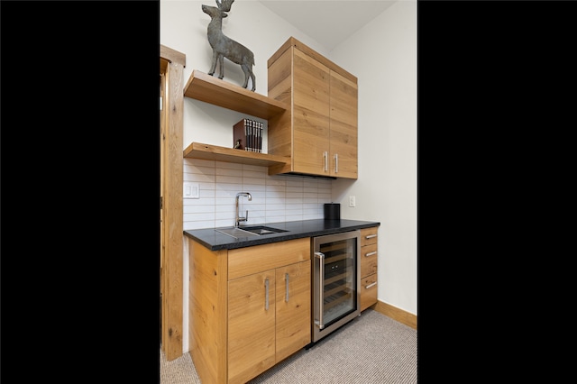 kitchen featuring wine cooler, sink, light tile floors, and tasteful backsplash