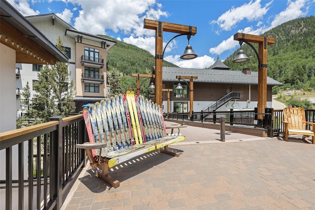 view of terrace with a mountain view