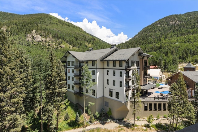 view of building exterior with a mountain view