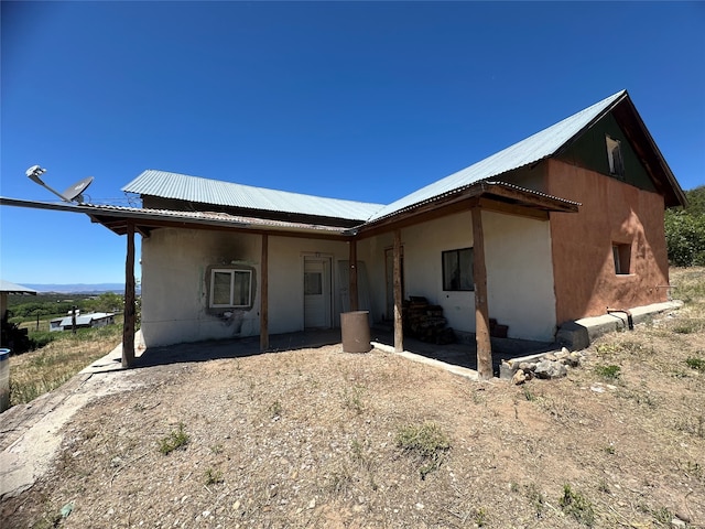 view of front of home featuring a patio area