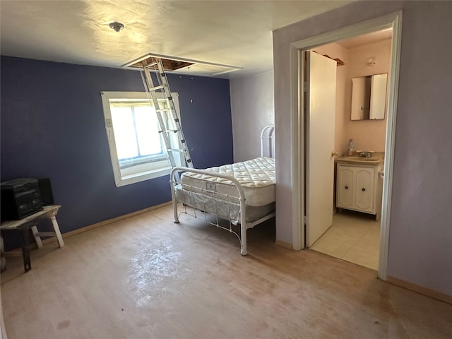 interior space featuring light tile patterned flooring and sink