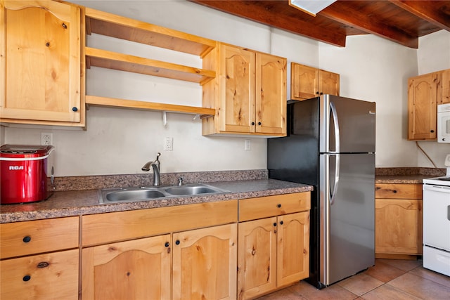 kitchen featuring beamed ceiling, white appliances, sink, and light tile patterned floors