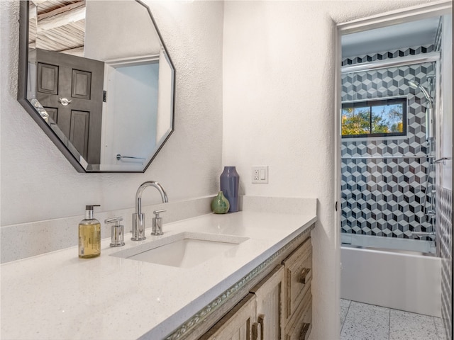 bathroom with tile flooring, large vanity, and bathtub / shower combination