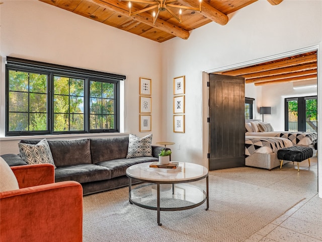 tiled living room featuring wooden ceiling, ceiling fan, and beamed ceiling