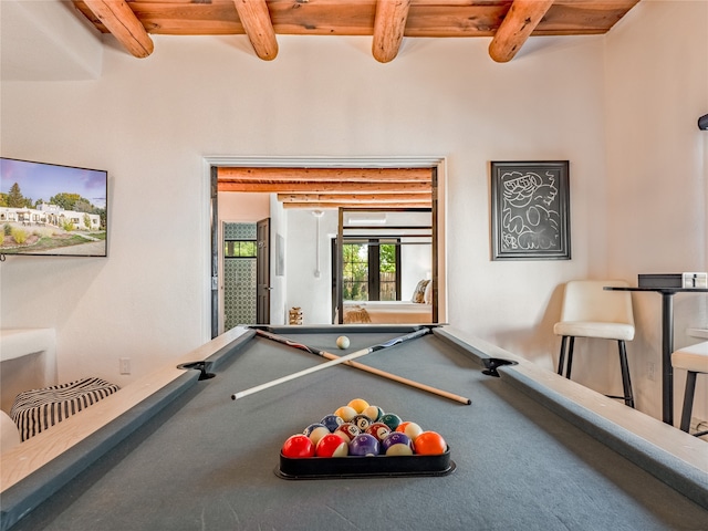 playroom featuring beamed ceiling and pool table