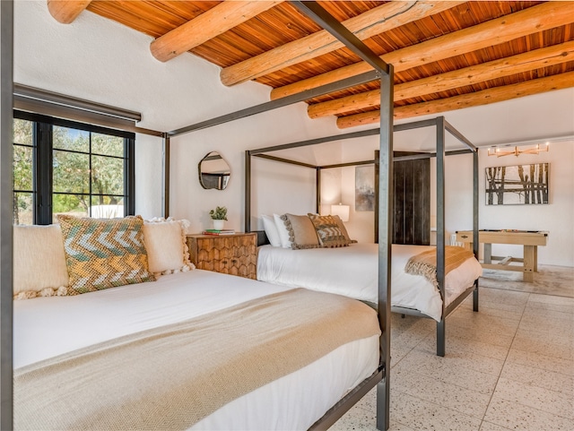 tiled bedroom with wooden ceiling and beam ceiling