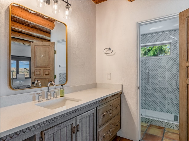 bathroom with oversized vanity and tile floors