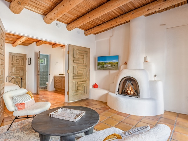 tiled living room with beamed ceiling and wooden ceiling