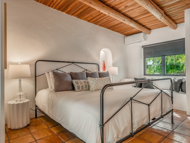 bedroom with an AC wall unit, tile flooring, wooden ceiling, and beam ceiling